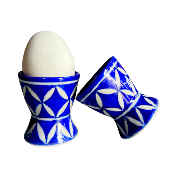 C:\Users\Microsoft\Desktop\mash venture\mash venture\Product Variety Details\Handcrafts Items\Heartful Catelog\Blue Pottery Products\HFC Blue Pottery Egg holder (2).png