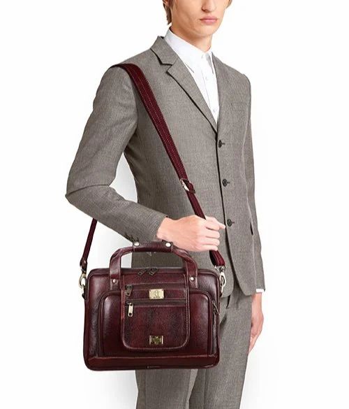 https://5.imimg.com/data5/SELLER/Default/2023/6/319062188/RU/QO/GY/185317985/bhlb-211-brown-hileder-pure-genuine-leather-spacious-14-inches-laptop-laptop-messenger-bag-for-gents-1000x1000.jpg